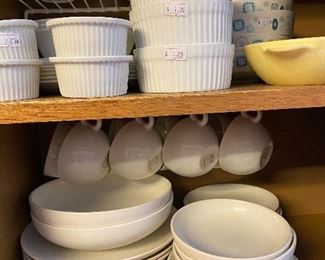 Bottom shelf is Russell Wright