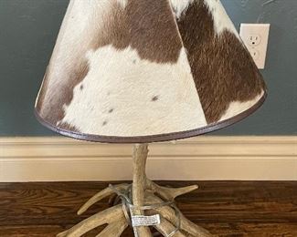 authentic rack of antlers & real raw hide lamp shade