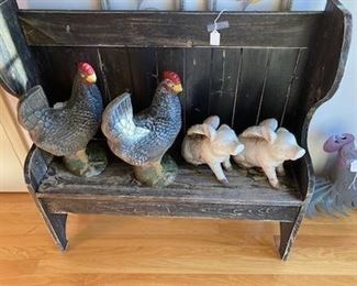 Primitive style bench; concrete garden figures