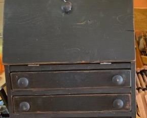 One of two primitive style desks