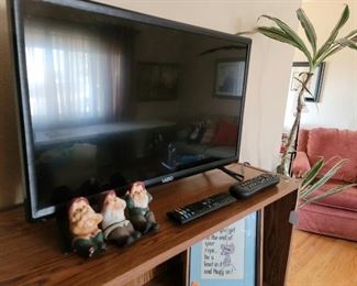 Hear, speak, see no evil elves & one of several tvs/monitors