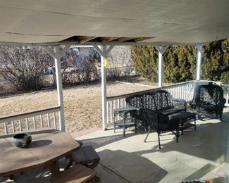 Black wicker & wooden picnic table ensemble