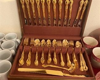 Community gold plated silverware set for 12