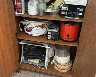 . . . some kitchen items: crock pots, waffle maker, cooker