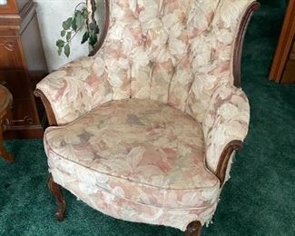 . . . one of two matching French Provincial chairs