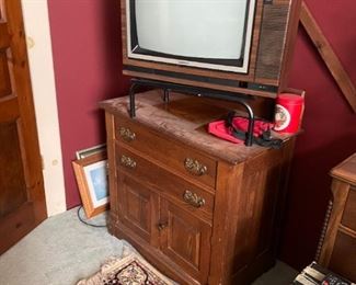 . . . another commode with box TV