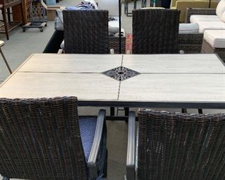 Tile top patio table and four chairs