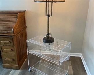 MCM acrylic bar/service cart and a Restoration Hardware metal table lamp with metal mesh shade - shown with Edison Bulbs