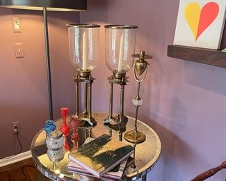Mirrored side table, brass and glass candle holders, Venetian glass bud vases, and more!