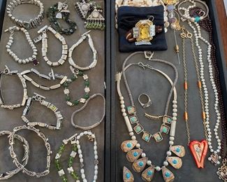 Jewelry:  gold, sterling, and Prada bracelet