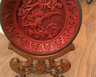 Carved Cinnabar plate on Carved Wood Stand.