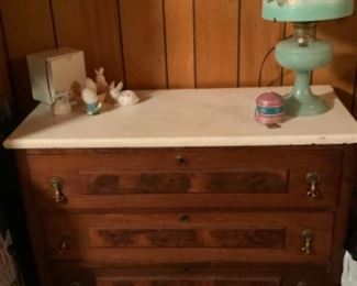 Great antique dresser with a stone top.