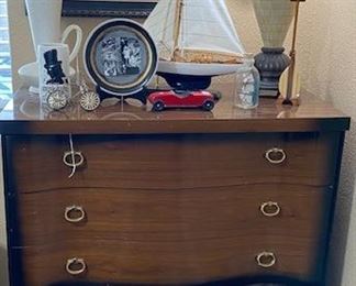 VINTAGE 5 DRAWER DRESSER, SIGNED ORIGIONAL ART WORK, VINTAGE CERAMIC EWER, DECORATIVE BONE AND METAL LAMP