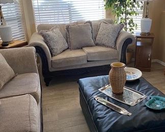 LOVE SEAT, CERAMIC LAMPS AND LARGE LEATHHER OTTOMAN