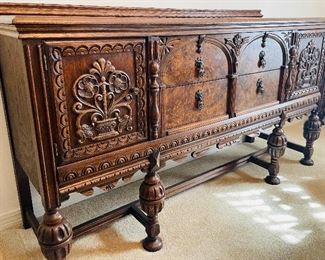 $395 
&nbsp;Wood Oak & Burl Walnut Sideboard highly carved 
64Lx19Dx35 1/2T