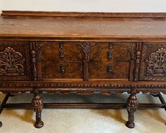 $395 
&nbsp;Wood Oak & Burl Walnut Sideboard highly carved 
64Lx19Dx35 1/2T