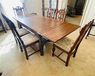$695 
Wood Oak dining table 58Lx37Hx29W with 5 chairs + 1 Captain chair&nbsp;
2 leaves of 14" each.