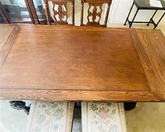 $695 
Wood Oak dining table 58Lx37Hx29W with 5 chairs + 1 Captain chair&nbsp;
2 leaves of 14" each.