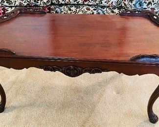 $95 
Carved walnut French style coffee table 39Wx20Dx16H