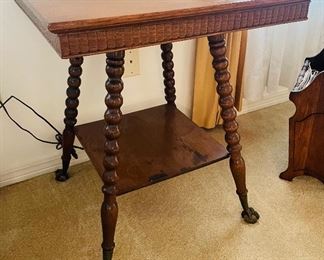 $120 
Tiger oak wood table with ball legs and glass feet 24Wx24D29H