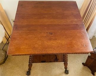 $120 
Tiger oak wood table with ball legs and glass feet 24Wx24D29H