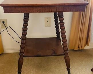 $120 
Tiger oak wood table with ball legs and glass feet 24Wx24D29H