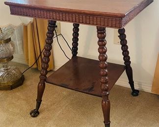 $120 
Tiger oak wood table with ball legs and glass feet 24Wx24D29H