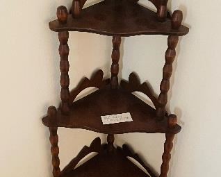 $70 
Corner wood shelve light weight 21Wx12Dx59H