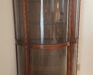 $250 
Curio bowfront walnut 40Lx18Dx72T New