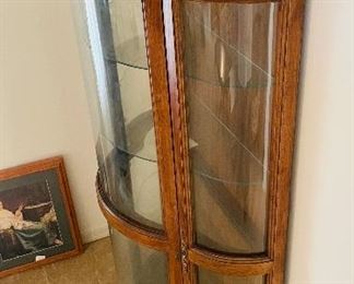 $250 
Curio bowfront walnut 40Lx18Dx72T New