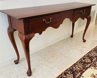 $250 
Thomasville wood console 57Lx16Wx29H mahogany