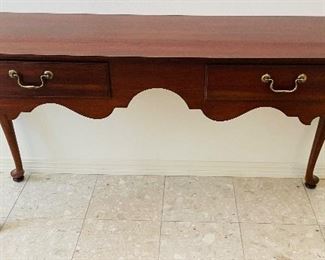 $250 
Thomasville wood console 57Lx16Wx29H mahogany