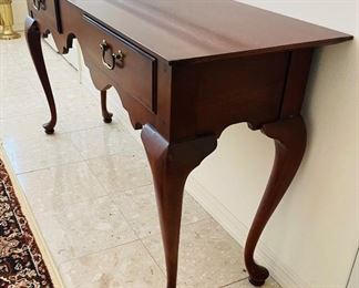 $250 
Thomasville wood console 57Lx16Wx29H mahogany