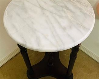 $50 
Marble stand on wood base round 13 1/2W x 47T
