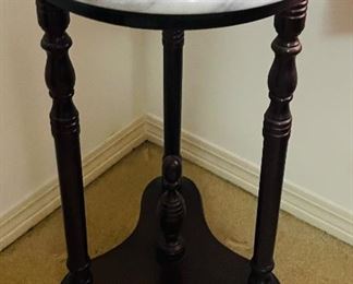 $50 
Marble stand on wood base round 13 1/2W x 47T