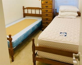 $200 
Set of two twin beds (mattress as bonus or leave behind)

$150 
Tall skinny lingerie pine chest 7 drawers 17Wx14Dx48T