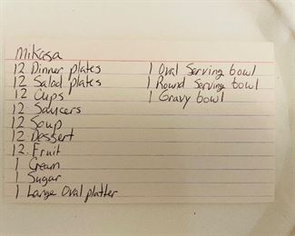 $150 
Mikasa bone china set with gold trim