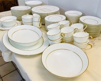 $150 
Mikasa bone china set with gold trim