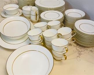 $150 
Mikasa bone china set with gold trim