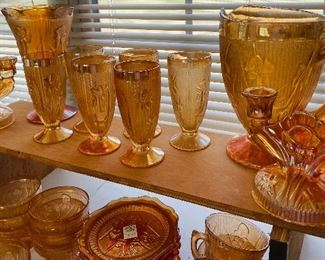 $300 
Iris & Herringbone peach marigold set 8 bowls/6 pudding/ 6  ice tea glasses
7 dinner pl, 12B&B, 1 round pl, 1 serving bowl
6 cups/ 5 sherry glasses / 9 ice cream / C&S / butter or
  cheese plate&nbsp;
1 pitcher / 1 vase fluted, 2 candlesticks&nbsp;