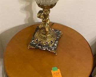 $150 
Pair of maple wood round tables with shelve 25Hx 20W
