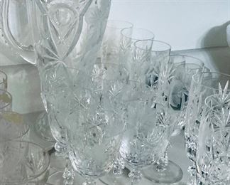 $140 
set of 36 pieces etched crystal floral/grapes crystal