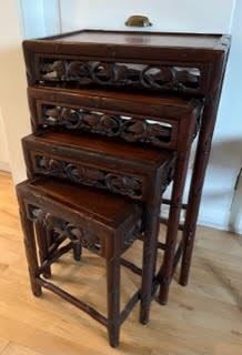 Antique asian nesting tables extended.