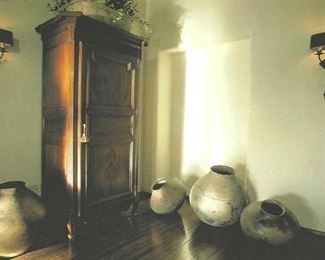 $680 18th c. French bonnetière. Bonnet cabinet fitted as a bar with glass shelves and faux finish drawers behind the doors. 38” x 29” x 87”H.  Your new barmoire!