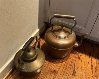 Copper kettles for sale during in-person shopping Friday and Saturday.