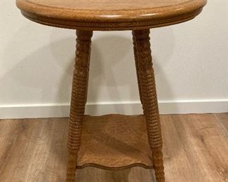$ 80.   Round antique oak table on unique feet.  20" diameter x 28"h.