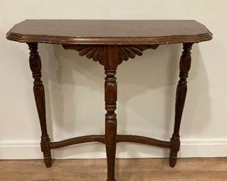 $60. Demi-lune table 27.5'w x 14"d x 29"h 