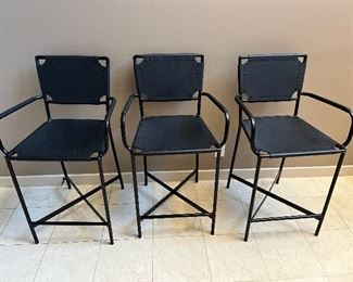 Three Laredo black leather counter height stools from Crate & Barrel.  Originally $399 each.  18"w x 17"d x 38"h.  24" high to seat.