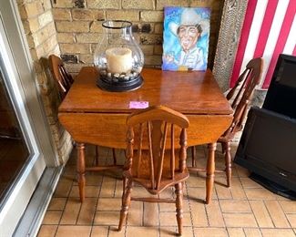 Antique drop leaf table with 3 chairs