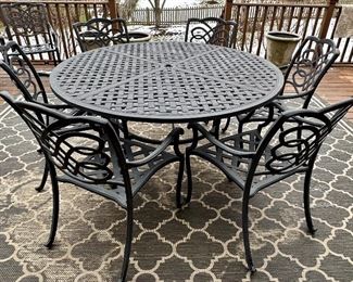 Aluminum Cast Patio Set Includes: Powder-Coated Round Dining Table with 8 Matching Chairs and Round Side Table.